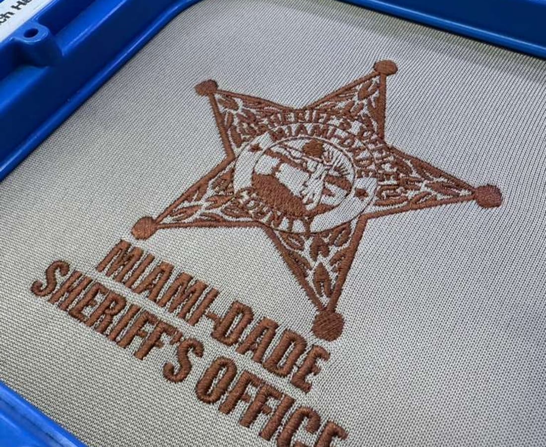 A Sheriff's Office emblem being embroidered in the hoop at CN Brandings