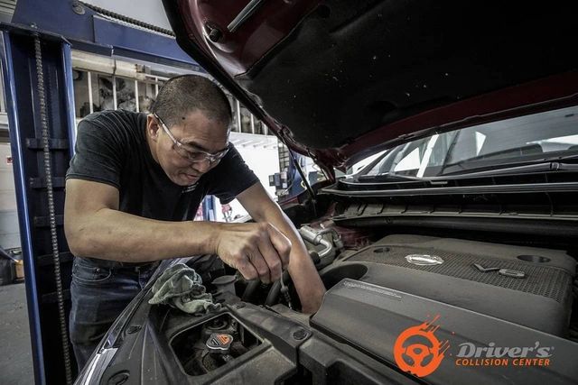 Technician working under the hood