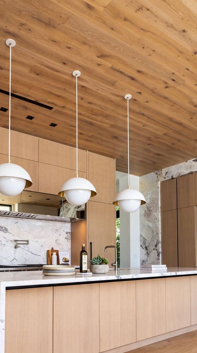 Kitchen island under pendant lights