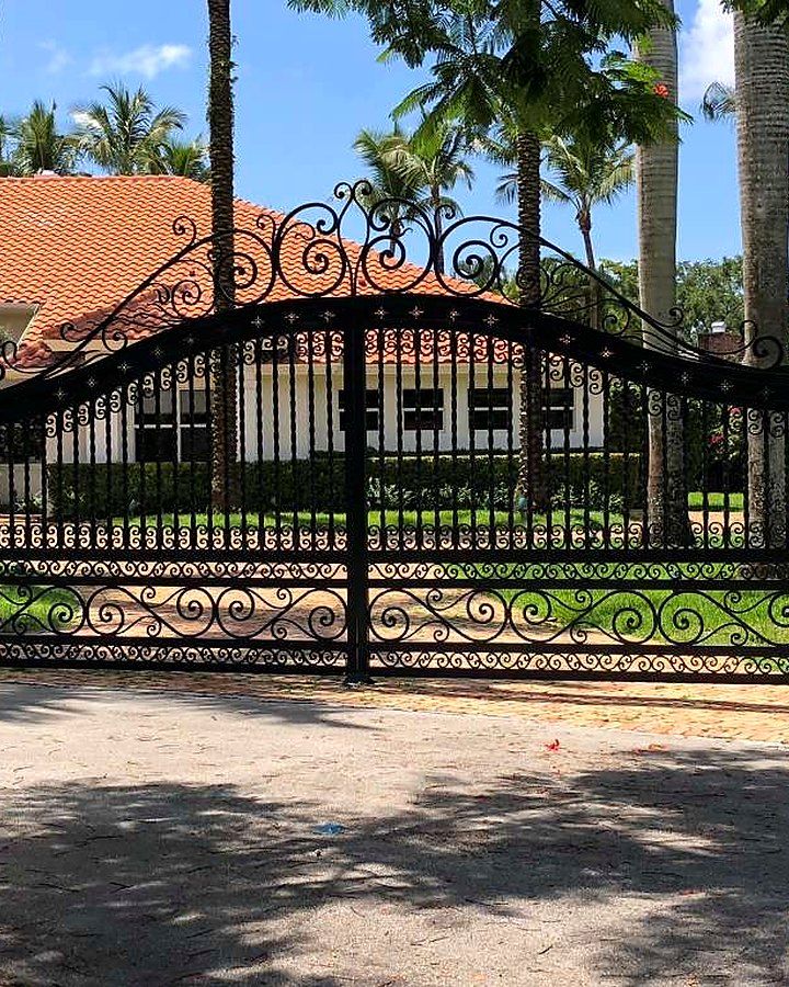 Arched ornamental iron gate